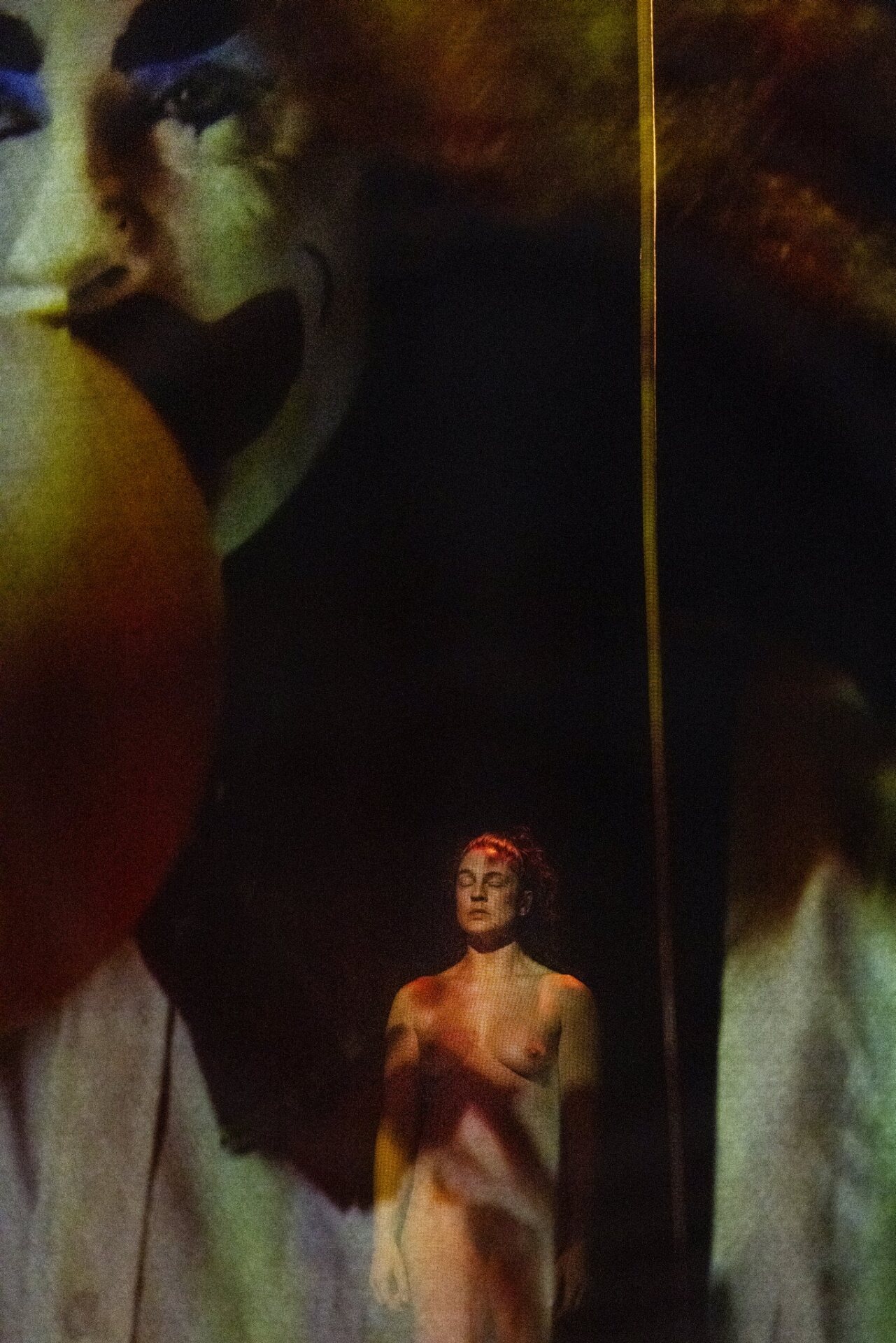 Laura Murphy, with the clown figure at her back 